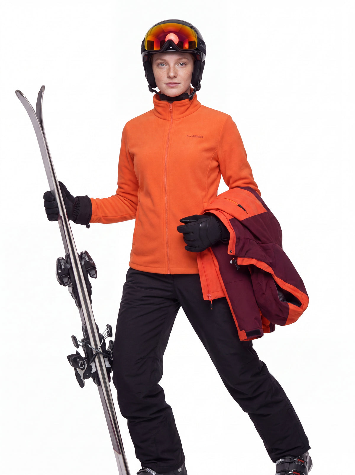 Modelo com jaqueta e esquis usando Jaqueta 3 em 1 Cordilheira Thermal Shield, Roupa da Marca Cordilheira com Boa proteção Confiável.