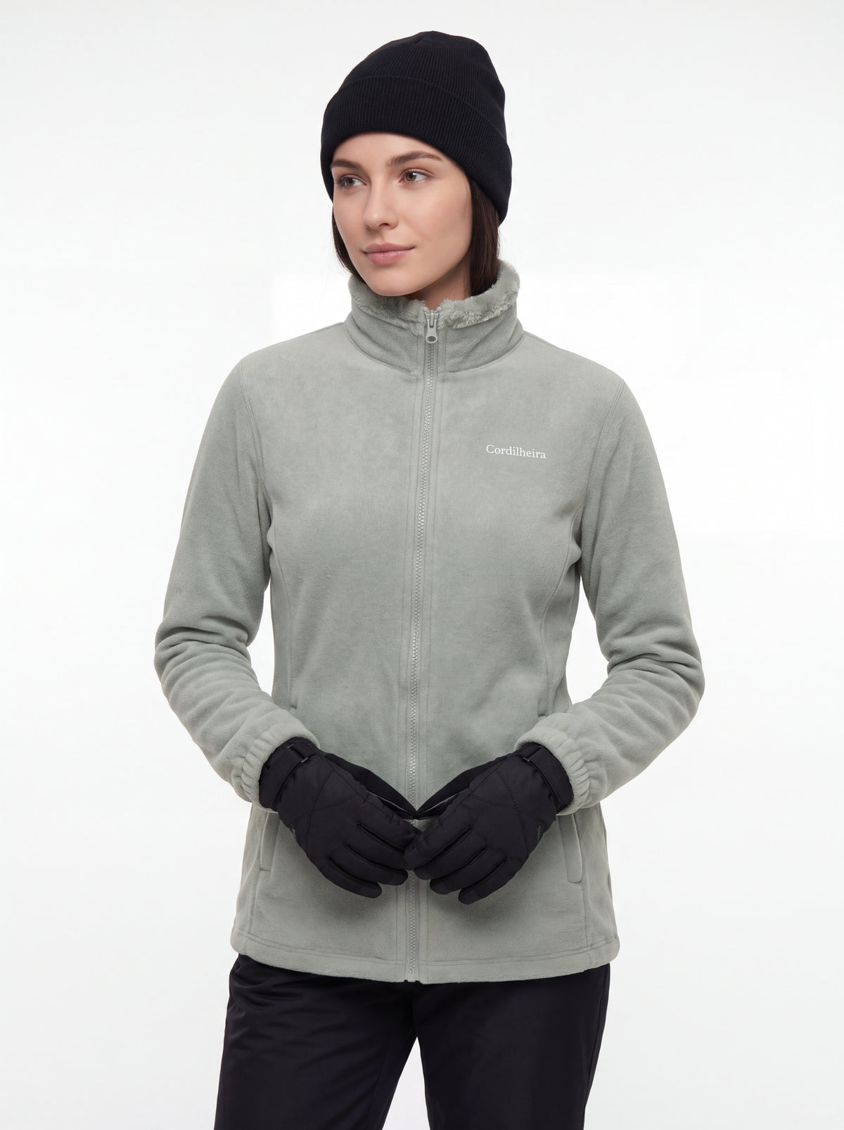 Modelo em pose esportiva usando Jaqueta 3 em 1 Cordilheira Alpine Feminina, Roupa da Marca Cordilheira com Boa resistência, qualidade e proteção Confiável para ski e esportes de inverno.